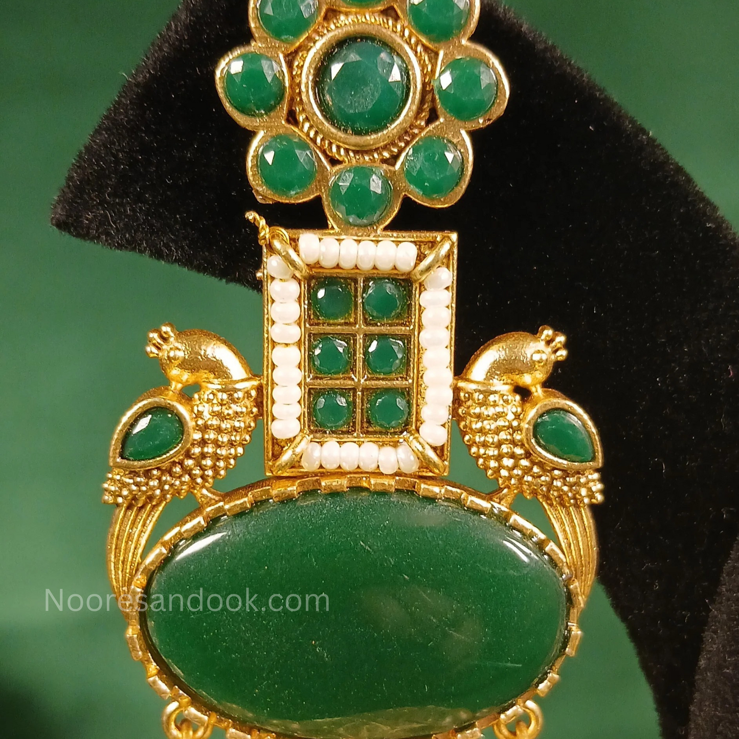Long Golden Jhumka with green stones
