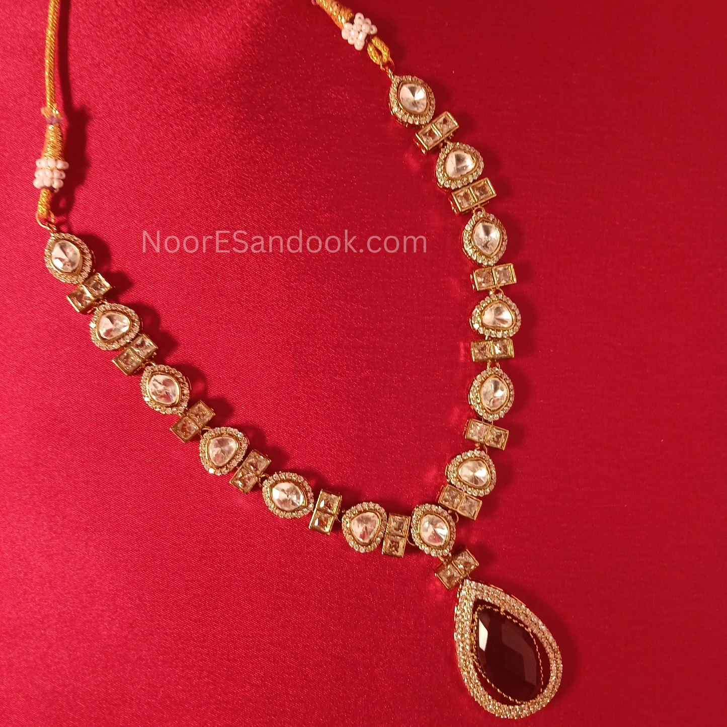 Polki and red stone necklace